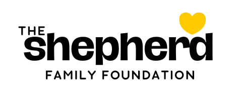 Logo for The Shepherd Family Foundation. Black writing with a yellow heart above 'Shepherd'