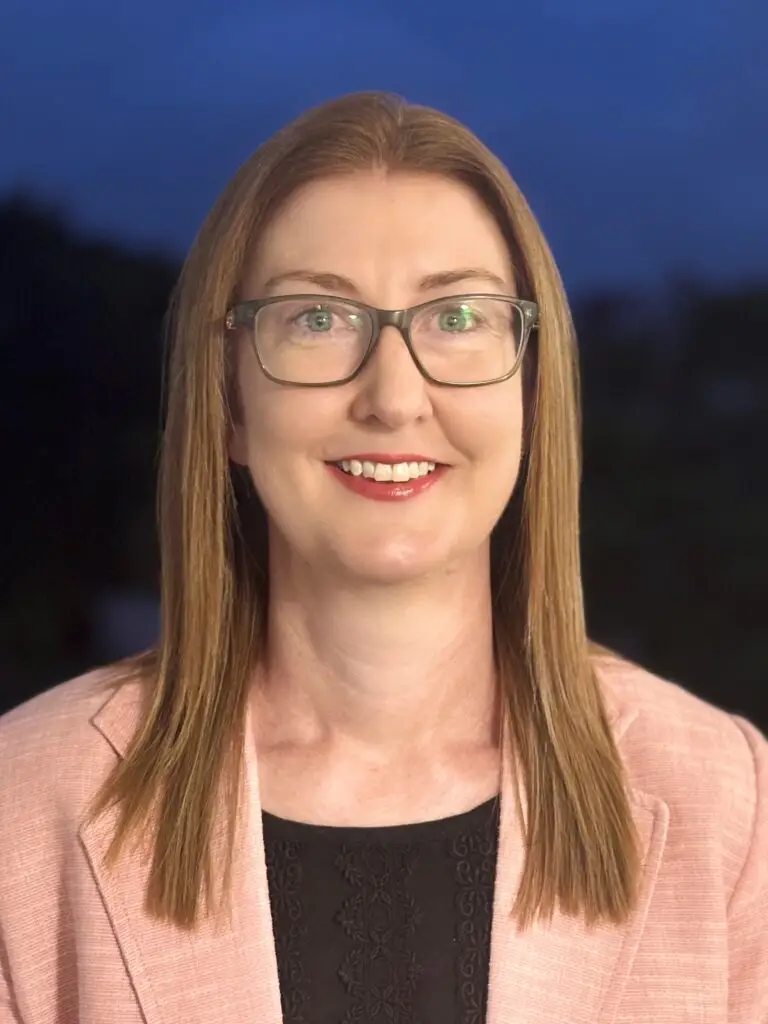 Headshot of QKP staff member Helen Smith