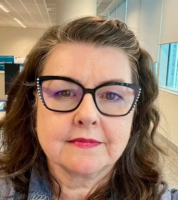 Headshot of Michelle Brown QKP employee